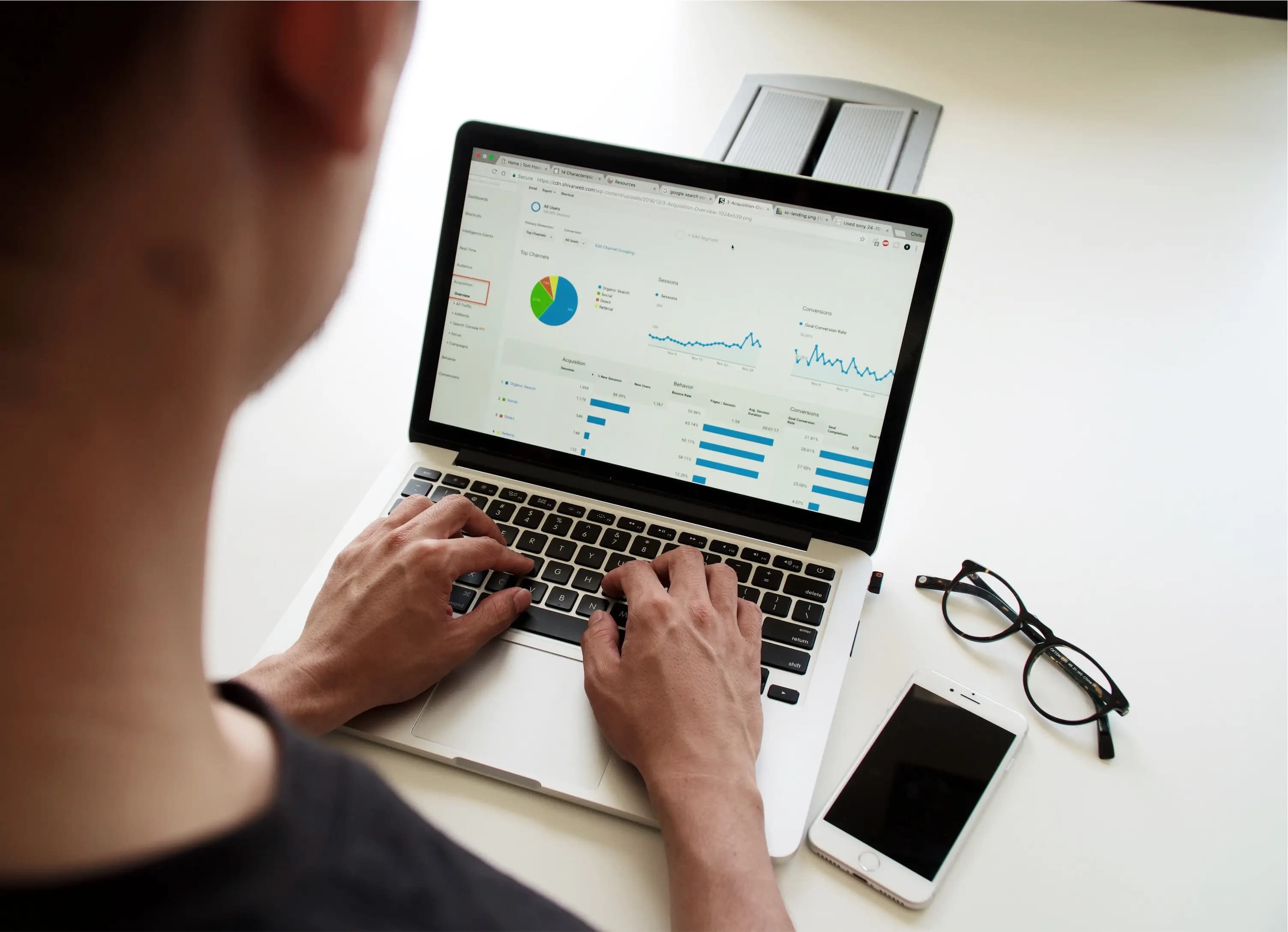 Person looking at search analytics on a laptop